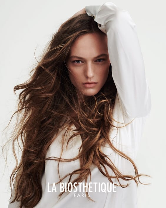 Smiling woman with flowing hair